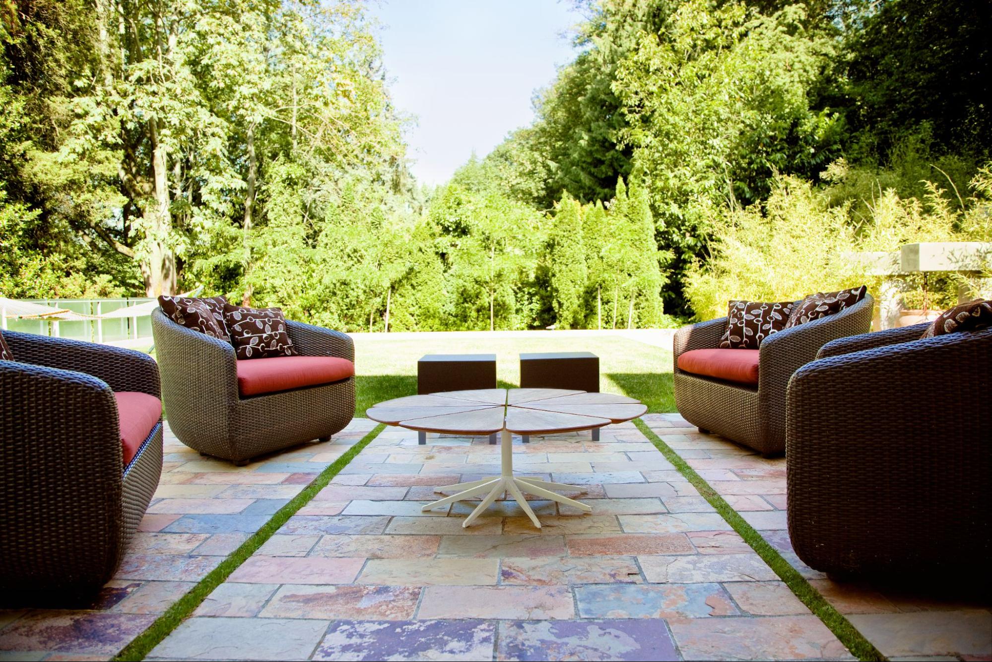Outdoor Spaces Transformed: Staining Concrete Patios, Walkways, and Pool Decks