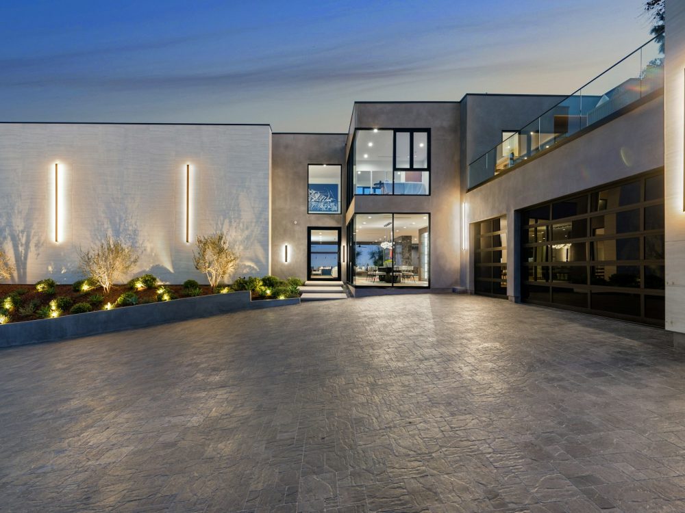 Home with landscaped concrete driveway, New Construction Home in Tarzana, California