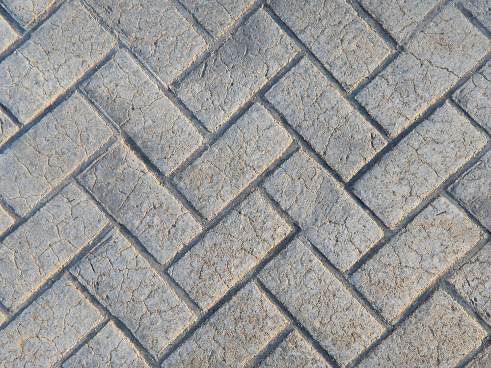 Stamped concrete floor texture background.