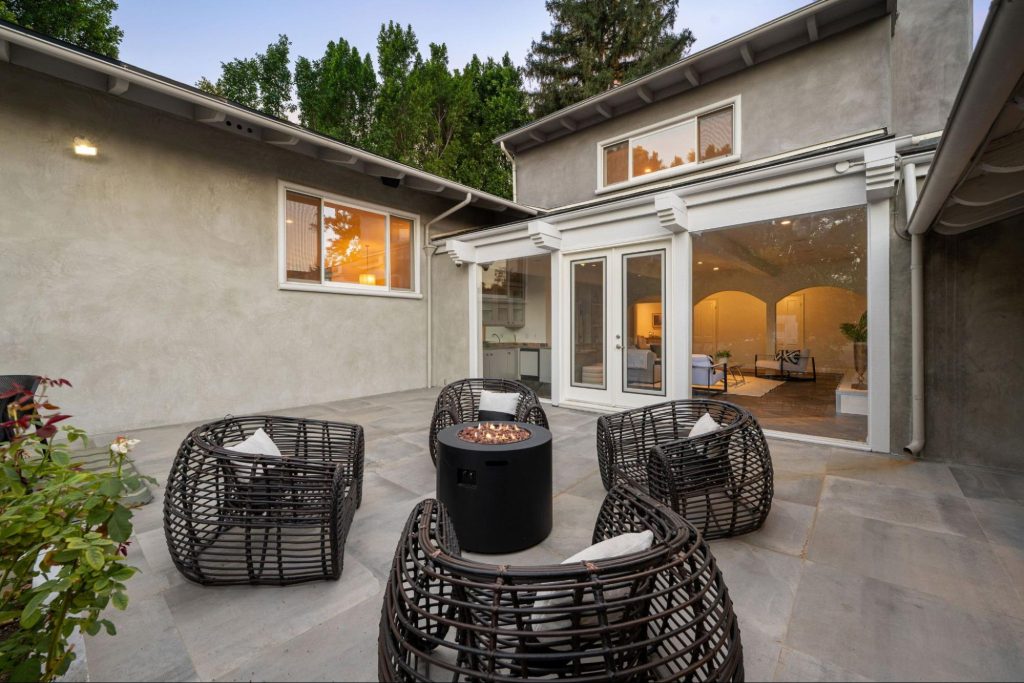 Concrete patio with outdoor furniture. 